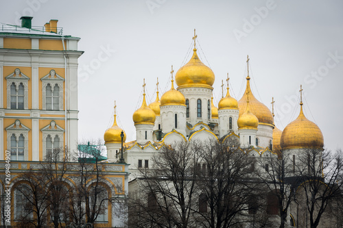 Golden dome rooftop of churches in the Kremlin. Assumption Cathedral or Cathedral of the Assumption on the north side of Cathedral Square of the Moscow Kremlin in Russia.