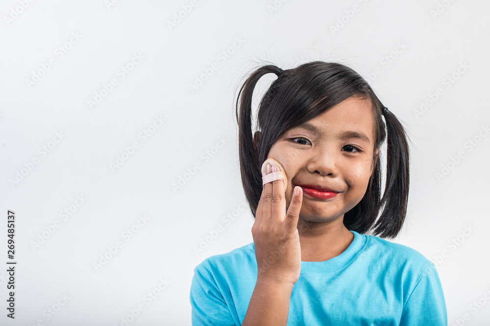 Portrait little girl makeup with her face Portrait little girl makeup with her face