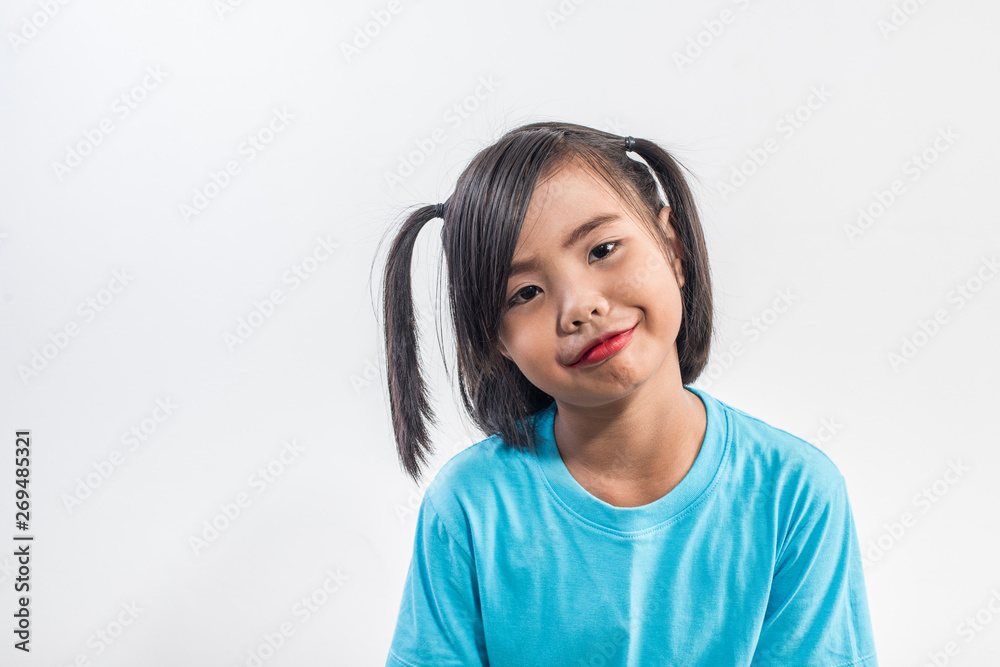 Portrait of Funny little girl acting in studio shot Portrait of Funny little girl acting in studio shot