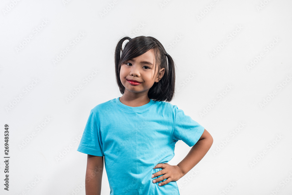 Portrait of Funny little girl acting in studio shot Portrait of Funny little girl acting in studio shot