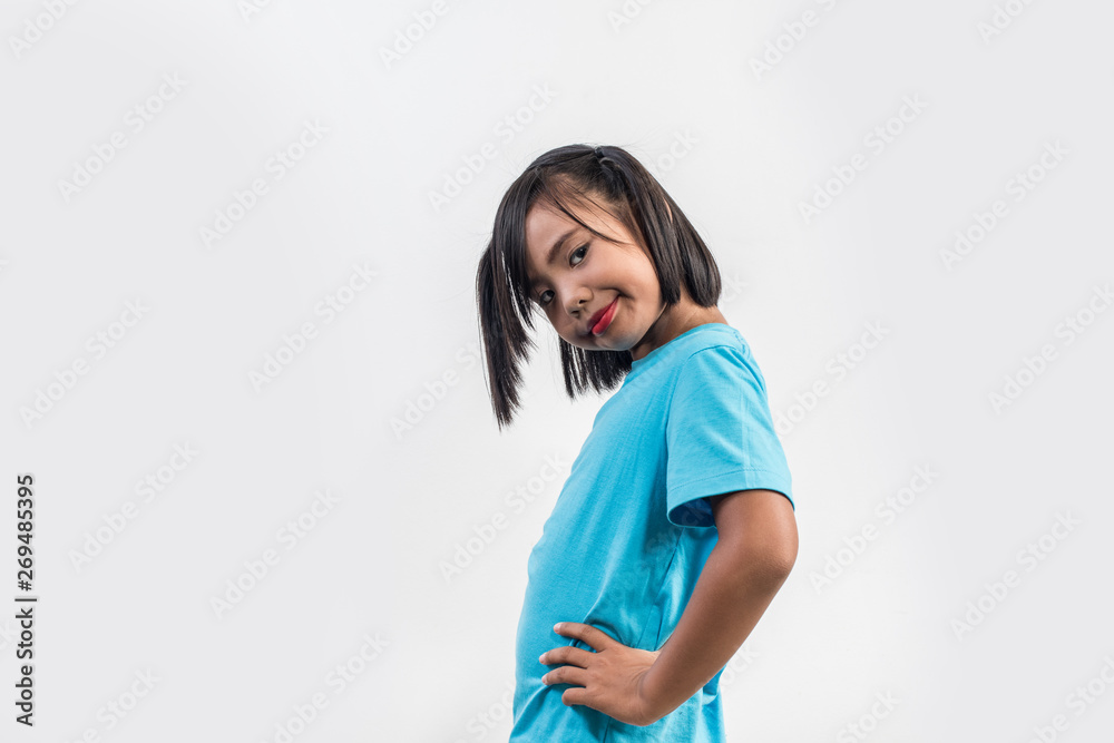 Portrait of Funny little girl acting in studio shot Portrait of Funny little girl acting in studio shot