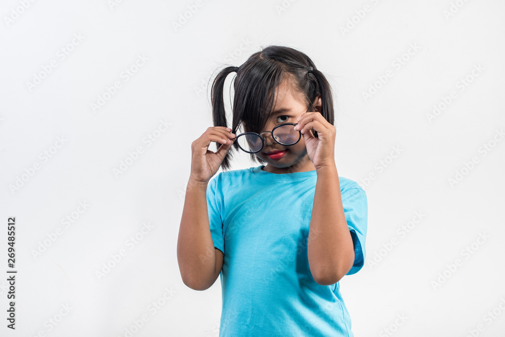 Portrait of Funny little girl acting in studio shot Portrait of Funny little girl acting in studio shot