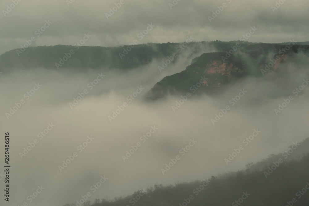 Low cloud in a valley in the mountains.