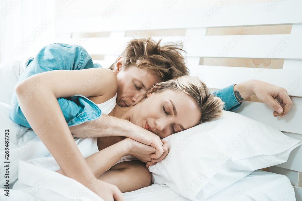 Happy Couple Playing together in the bedroom Happy Couple Playing together in the bedroom