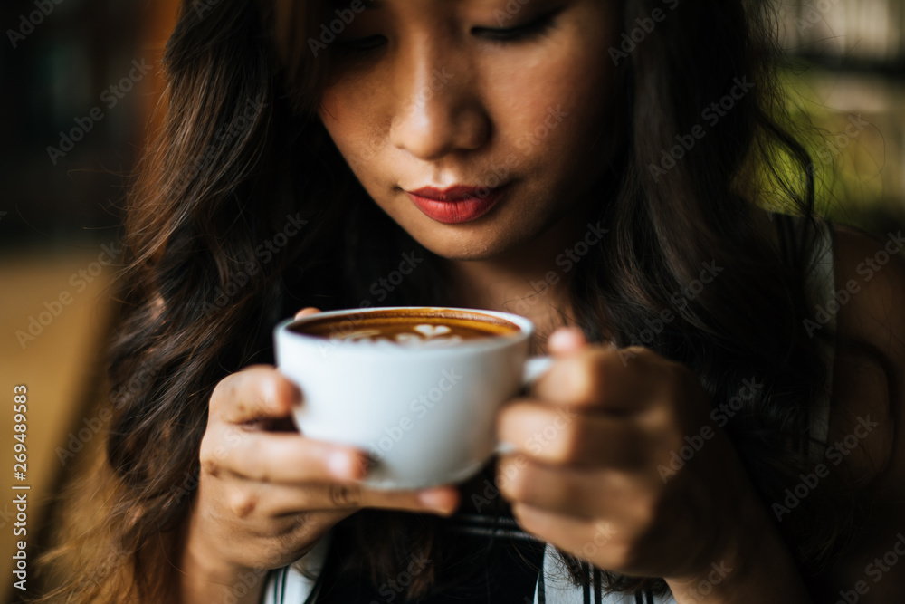 Portrait asian woman smiling relax in coffee shop cafe Portrait asian woman smiling relax in coffee shop cafe