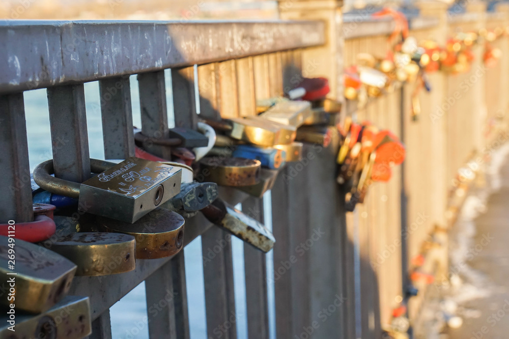 Irkutsk / Russia - 18 February 2019: love concept with name of couple on lock on the bridge