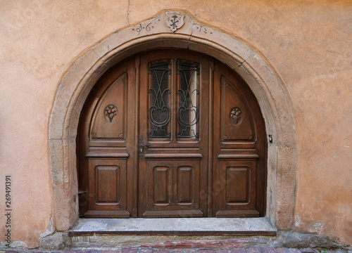 Ancient Medieval arched wooden doorway