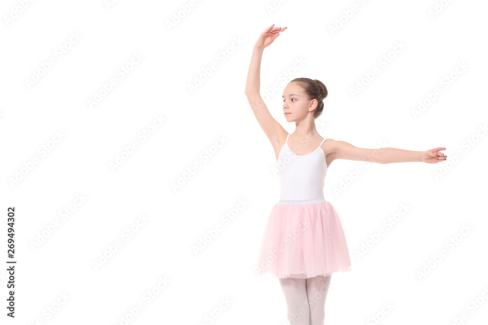 young girl ballerina posing on white background