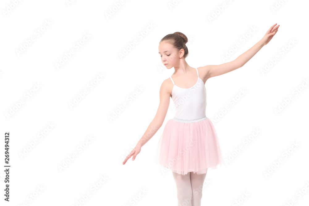 young girl ballerina posing on white background