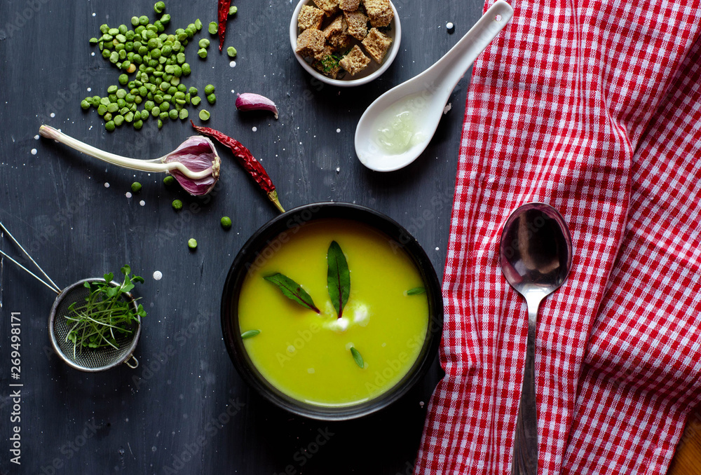 green pea cream soup healthy vegetarian organic food recipe with croutons, garlik and greens. Homemade traditional meal. green pea cream soup healthy vegetarian organic food recipe with croutons, garlik and greens. Homemade traditional meal.