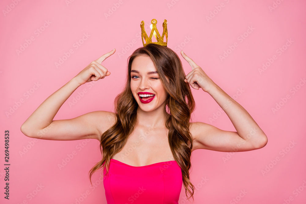 Close up photo beautiful she her lady hold hand arm direct headwear gold  accessories graduation party famous person wink eye wear shiny colorful  formal-wear dress isolated pink bright background Stock-Foto | Adobe