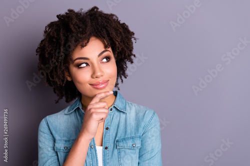 Close up photo of cute lovely charming millennial thoughts touch chin fingers hand palm look solve choose decide wear denim clothes isolated grey background photo