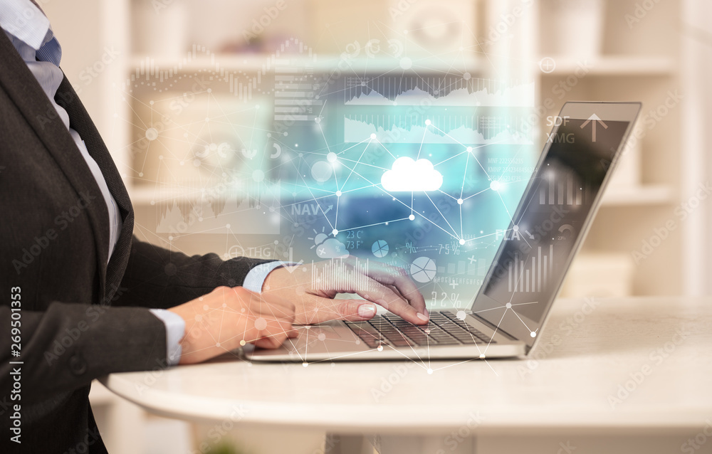 Business woman in homey environment using laptop with cloud technology concept
Business woman in homey environment using laptop with cloud technology concept