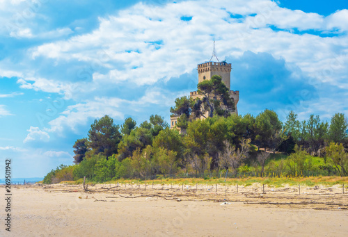 Pineto (Italy) - The touristic sandy beach of Abruzzo with the monumental pine forest and the famous tower castle called Torre di Cerrano photo