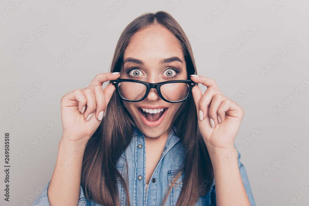 Close-up portrait of her she nice-looking attractive lovely winsome genius brainy cheerful cheery straight-haired lady opened mouth taking glasses off isolated over light white gray background Close-up portrait of her she nice-looking attractive lovely winsome genius brainy cheerful cheery straight-haired lady opened mouth taking glasses off isolated over light white gray background