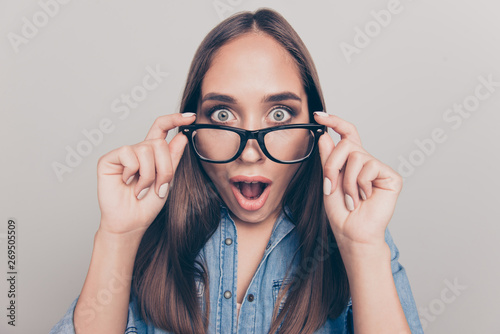 Close-up portrait of her she nice-looking attractive lovely pretty winsome cheerful cheery straight-haired lady opened mouth touching glasses isolated over light white gray background