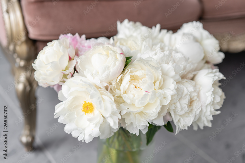 White peonies in a metal vase. Beautiful peony flower for catalog or online store. Floral shop concept . Beautiful fresh cut bouquet. Flowers delivery