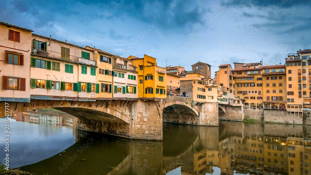 Ponte Vecchio bridge spans the Arno River in Florence, Italy