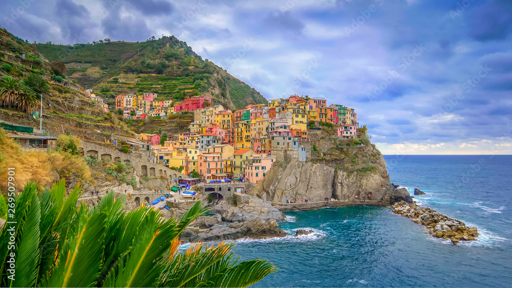 The seaside village of Manarola sits on the famous cliffs of Cinque Terre in La Spezia, Italy