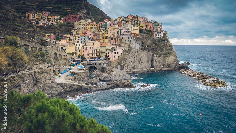 The seaside village of Manarola sits on the famous cliffs of Cinque Terre in La Spezia, Italy