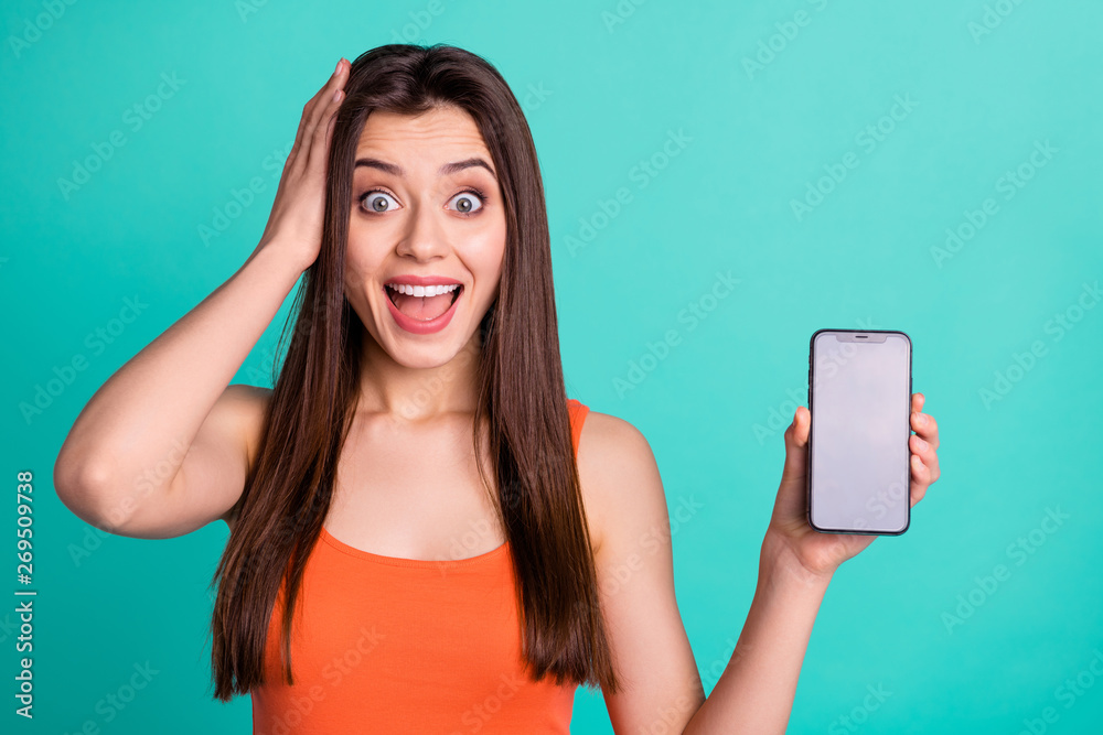 Portrait funny funky lady astonished impressed news novelty modern  technology decision choice advert advise display long hairdo touch head  palm yell expression youth clothes isolated teal background Stock Photo |  Adobe Stock