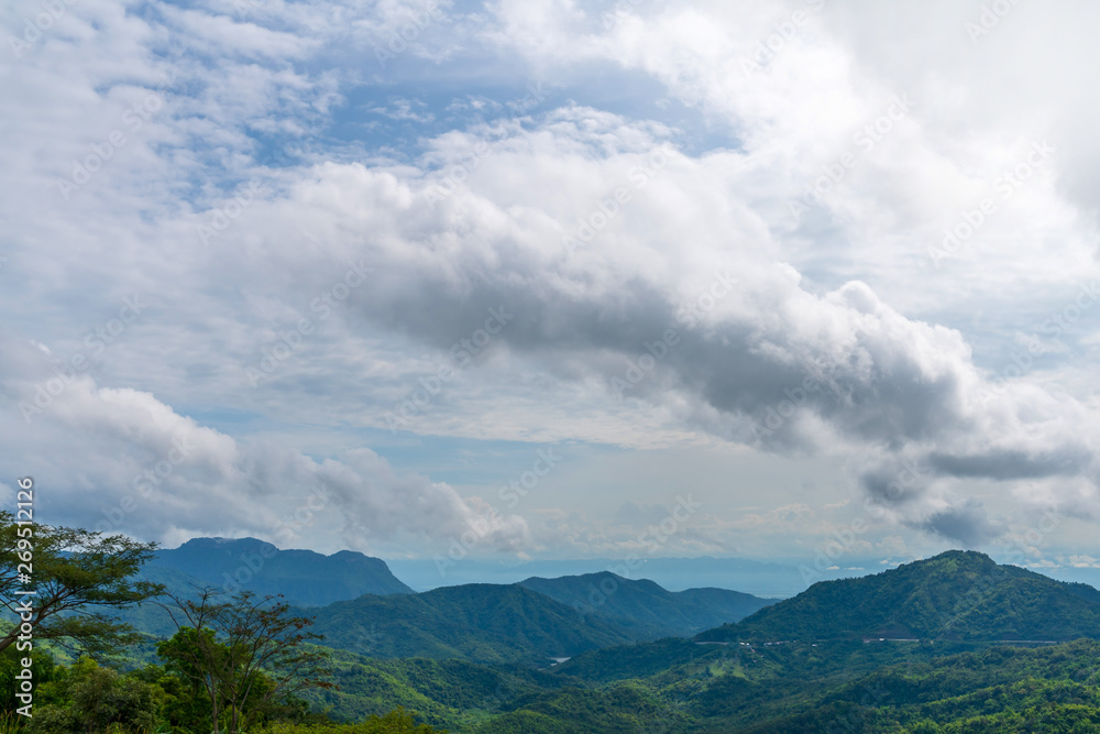 Blue sky high peak mountains fog hills mist scenery national park views at Phu Tub Berk, Khao Koh, Phetchabun Province, Thailand