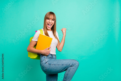 Close up side profile photo beautiful she her lady yelling bast test results arms hands school colored notebooks staff modern backpack wear specs casual white t-shirt isolated teal green background