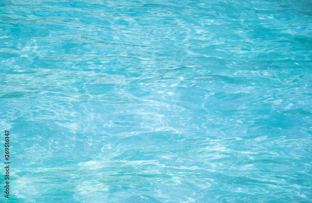 sunlit blue water background