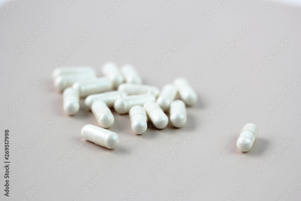 closeup of cbd vitamins pill capsules closeup of cbd vitamins pill capsules