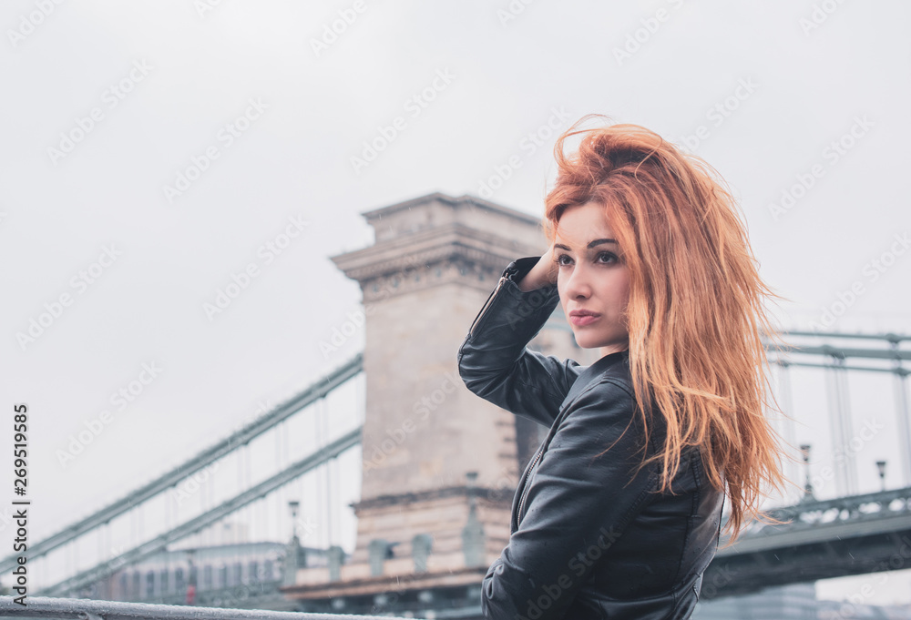 Tourism concept. Beautiful woman look at view of city streets, centre of city. Vacation in Budapest 