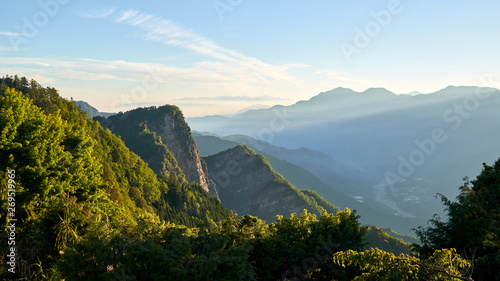 Sunrise, Alishan mountain, Taiwan. Popular tourist sightseeing attraction. Early morning.