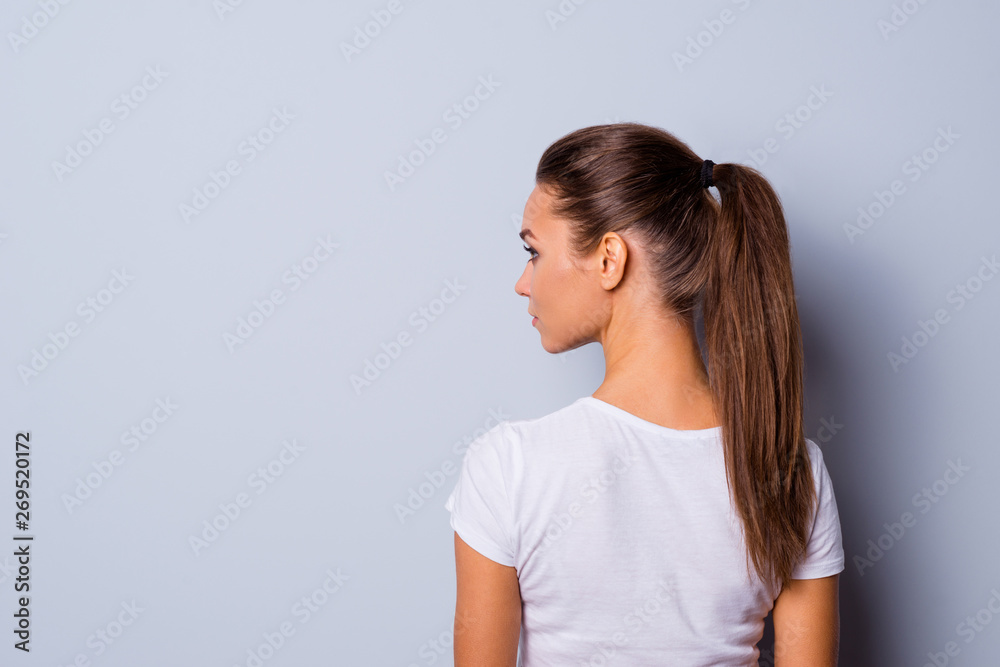 Close up back rear behind side profile view photo amazing beautiful she her  lady look side empty space not smiling reliable person wear casual white  t-shirt clothes isolated grey background Stock Photo