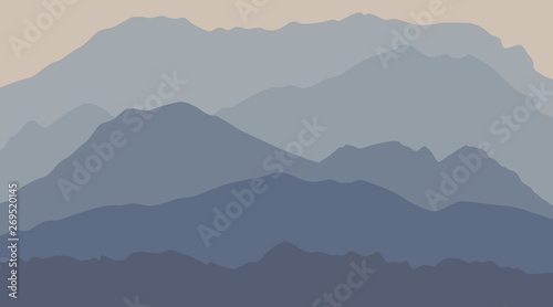 calm majestic mountain landscape with fog and mist