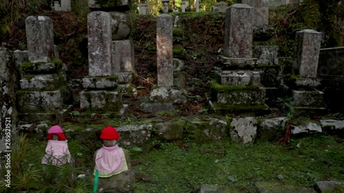 Japanese cemetery sideways walking shot photo