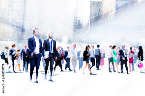 Business people rushing in the City. Beautiful abstract blurred image representing modern business life, success, moving concept.