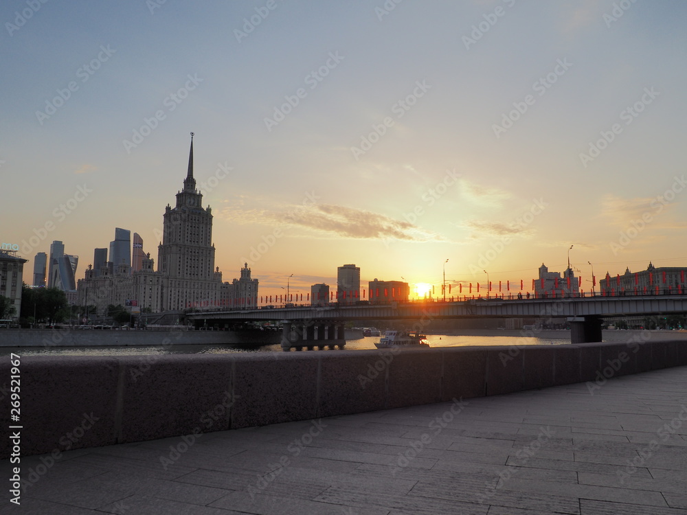 Obraz premium Cityscape and Landscape of downtown Moscow with Modern skyscrapers, office building and Moskva river over Sunrise sky, Moscow City, Russia