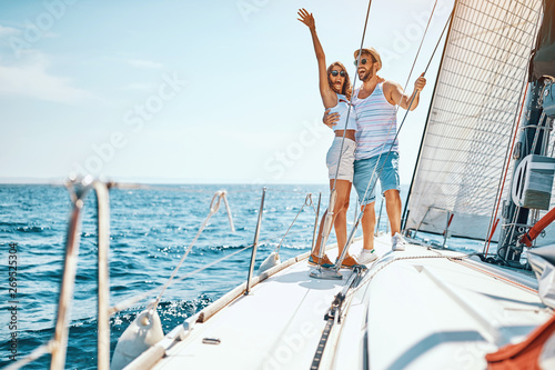Sexy man and woman on the luxury boat.