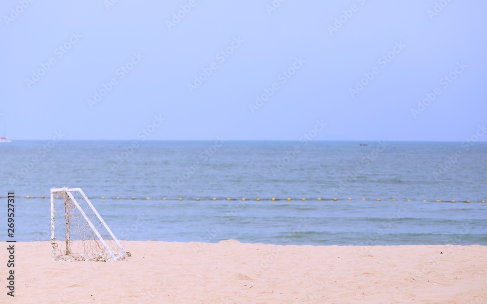Football goal on beach closeup ocean view landscape background Football goal on beach closeup ocean view landscape background