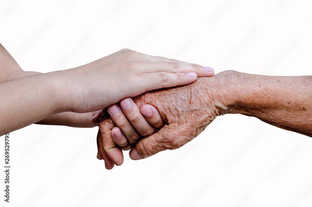 Encouragement old and young hands isolated on black background,include clipping path. Encouragement old and young hands isolated on black background,include clipping path.