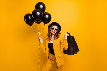 Close up photo beautiful amazing she her lady carry packs perfect look buy buyer present gift balloons birthday sale discount wear specs formal-wear costume suit isolated yellow bright background
