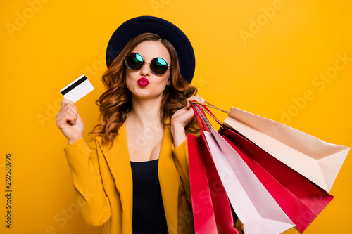 Close up photo beautiful she her model lady hands arms credit plastic card many packs buyer vacation traveler sale discount rich person wear specs formal-wear suit isolated yellow bright background photo