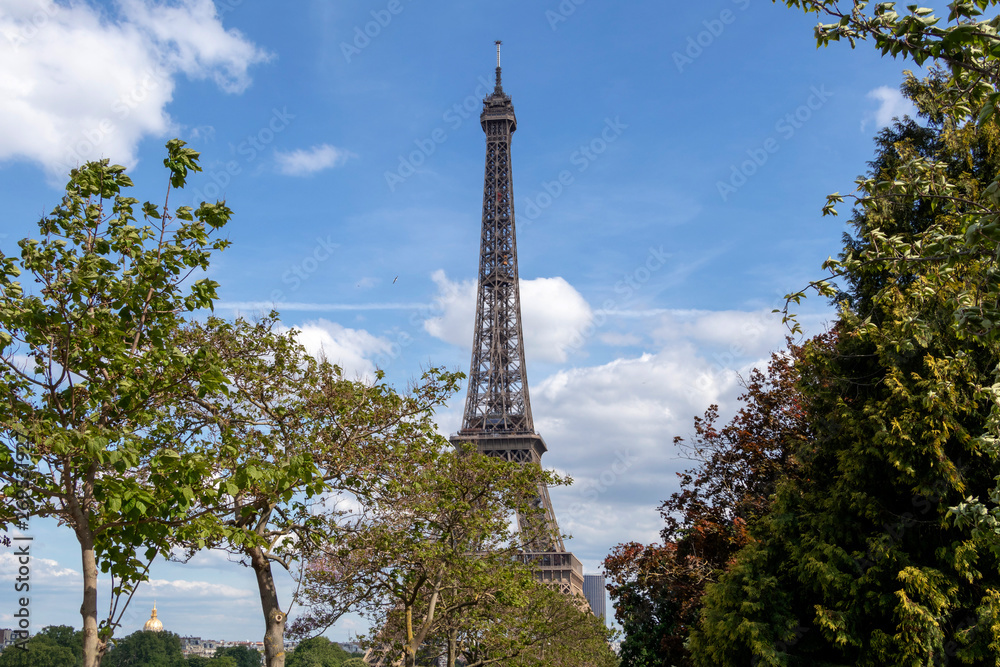 Eiffel Tower one of the most iconic landmarks of Paris located on the Champ de Mars in Paris, France Eiffel Tower one of the most iconic landmarks of Paris located on the Champ de Mars in Paris, France