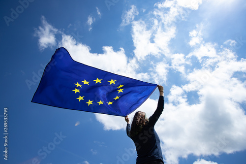 Woman with EU flag.