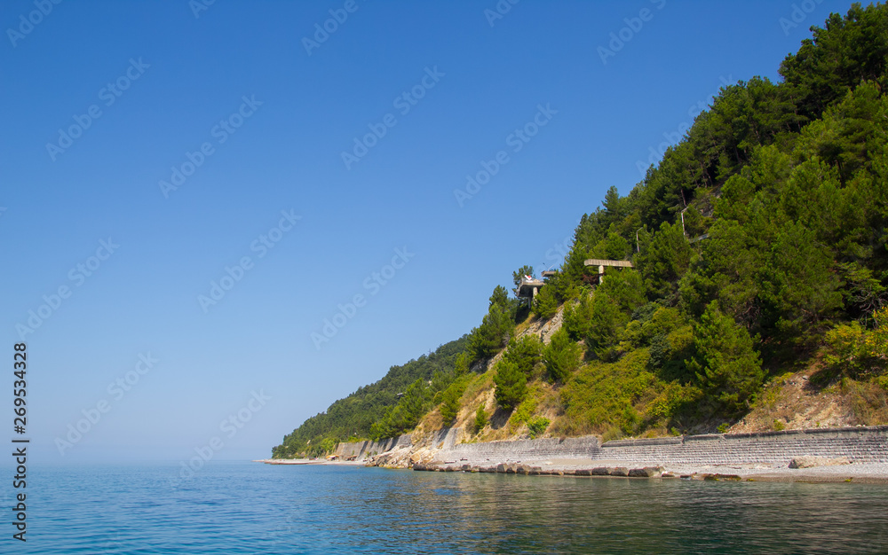 coastline with hills and grass, sea view