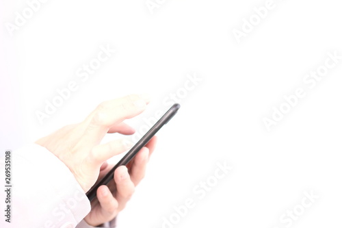 male hand holding smart phone