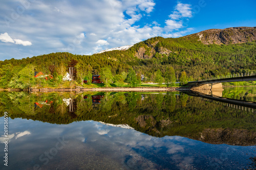 Small village near lake in Hordaland, Norway.