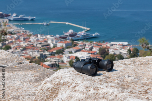 Limenas, Greece and the sea seen from a high observation point and binoculars