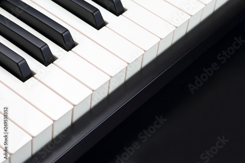 piano keys closeup on dark background