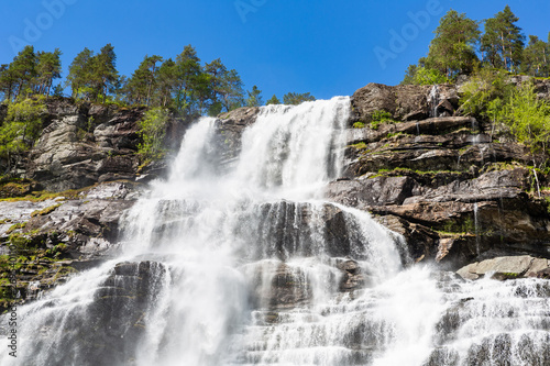 Tvidefossen waterfall in spring. Voss  Norway.