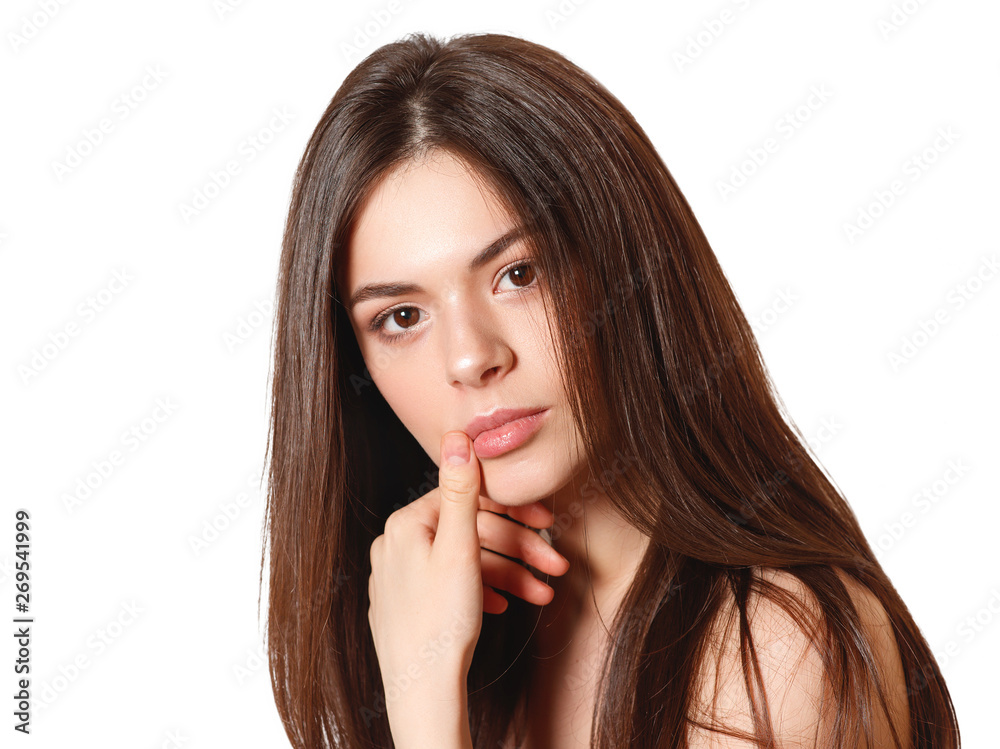 beauty portrait of a young beautiful brunette girl with brown eyes and straight long flowing hair isolated on white background beauty portrait of a young beautiful brunette girl with brown eyes and straight long flowing hair isolated on white background